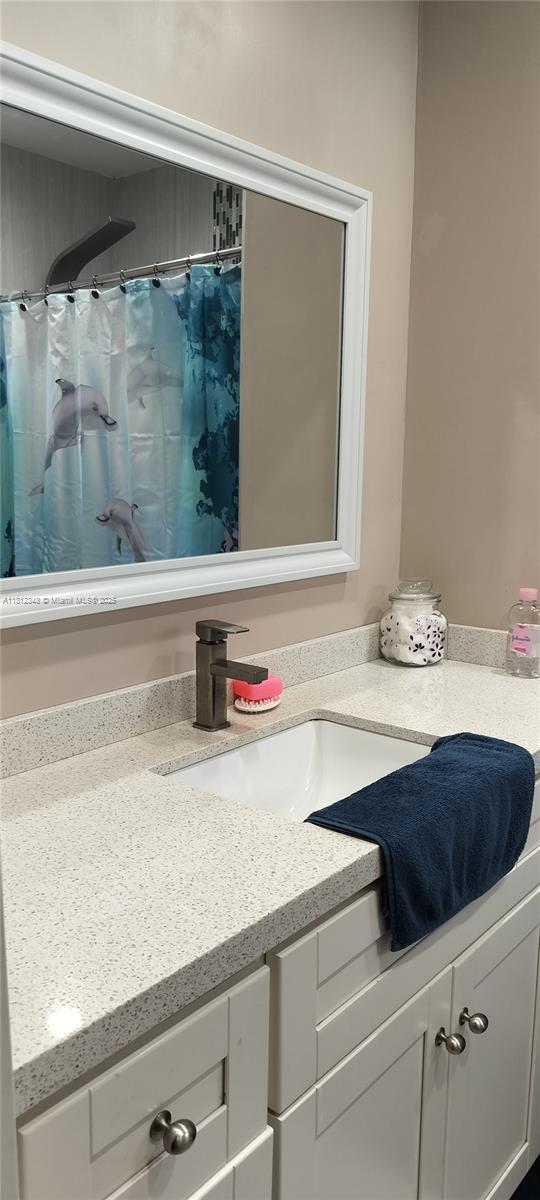 3149 W 68th Pl, Hialeah, FL 33018 - full bathroom featuring vanity