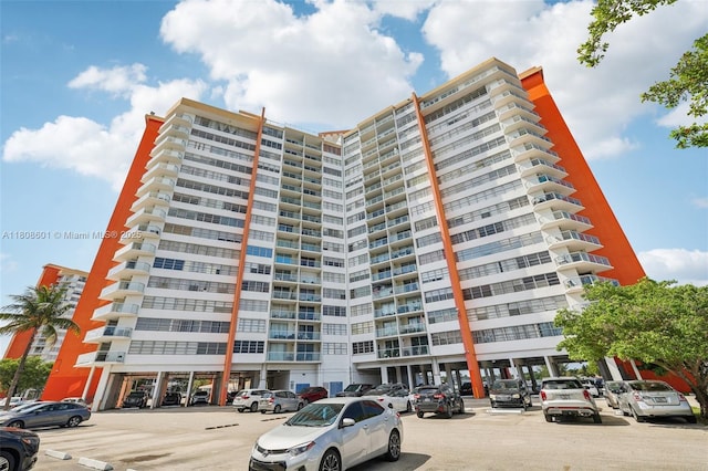 1351 NE Miami Gardens Dr Unit 1111E, Miami, FL 33179 - view of apartment building / complex with uncovered parking