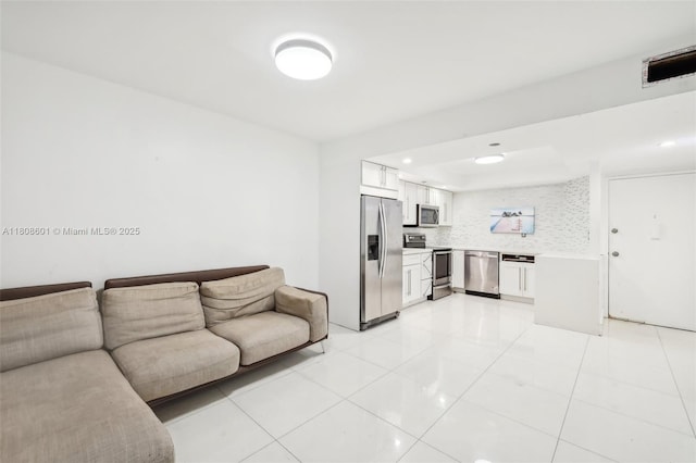 1351 NE Miami Gardens Dr Unit 1111E, Miami, FL 33179 - living room featuring light tile patterned floors