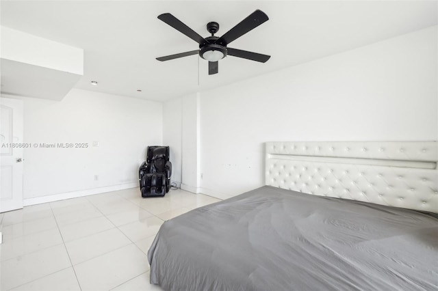 1351 NE Miami Gardens Dr Unit 1111E, Miami, FL 33179 - tiled bedroom with baseboards and ceiling fan