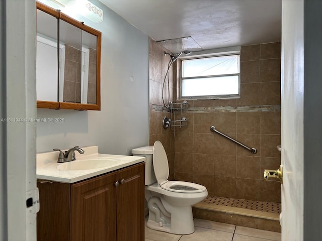1333 E Hallandale Beach Blvd Unit 134, Hallandale Beach, FL 33009 - bathroom featuring toilet, vanity, a tile shower, and tile patterned flooring