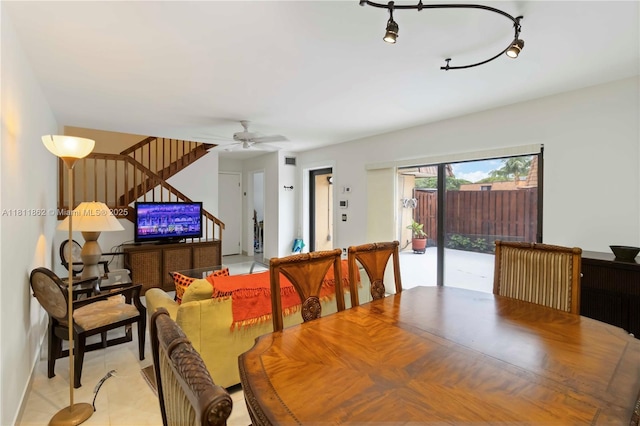 3003 30th Ln, Green Acres, FL 33463 - dining space with stairway and a ceiling fan
