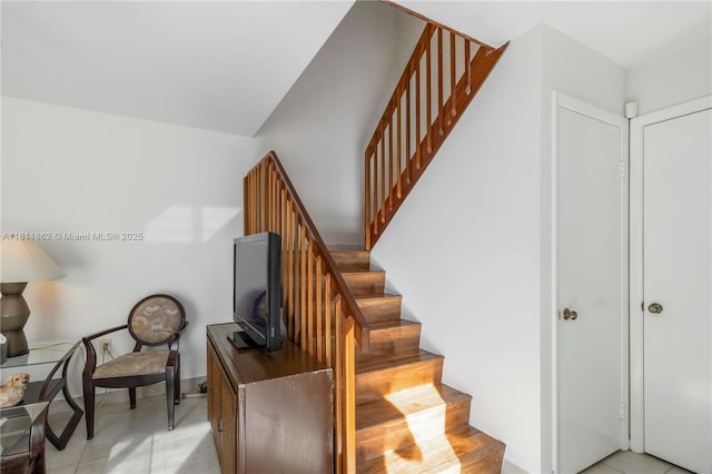3003 30th Ln, Green Acres, FL 33463 - staircase featuring lofted ceiling