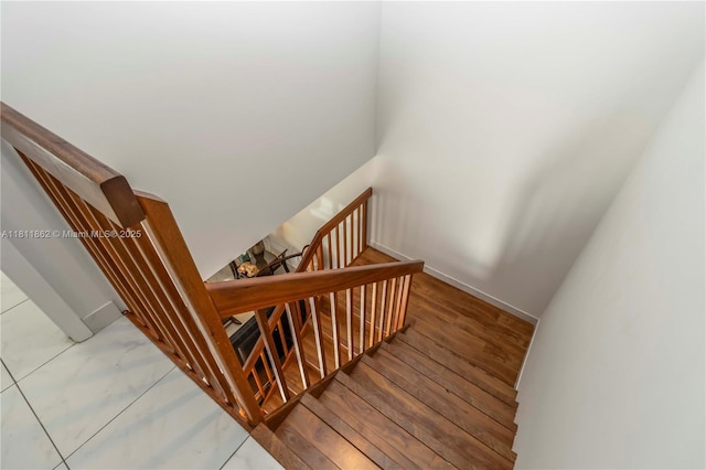 3003 30th Ln, Green Acres, FL 33463 - stairway with baseboards and wood finished floors
