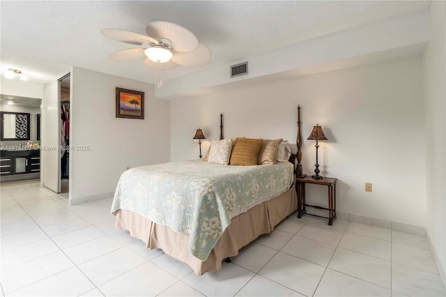 3003 30th Ln, Green Acres, FL 33463 - bedroom with light tile patterned flooring and a ceiling fan
