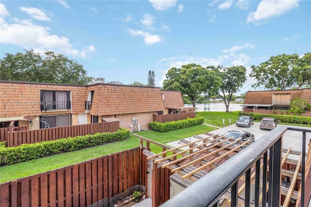 3003 30th Ln, Green Acres, FL 33463 - wooden terrace with a water view