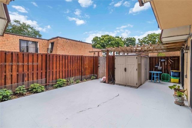 3003 30th Ln, Green Acres, FL 33463 - fenced backyard featuring a patio, a storage shed, and a pergola
