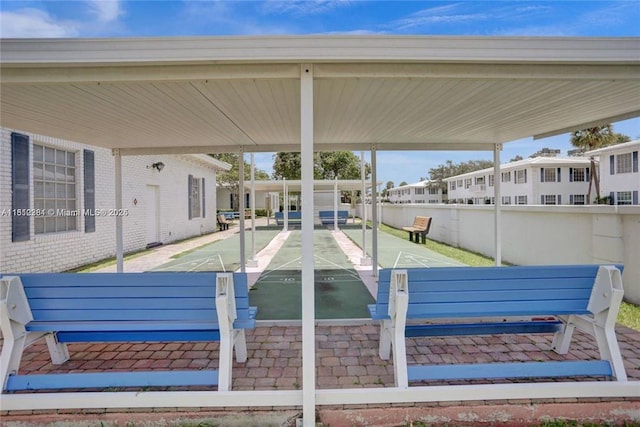 2181 NE 67th St Unit 628, Fort Lauderdale, FL 33308 - view of property's community featuring shuffleboard, a residential view, and a carport