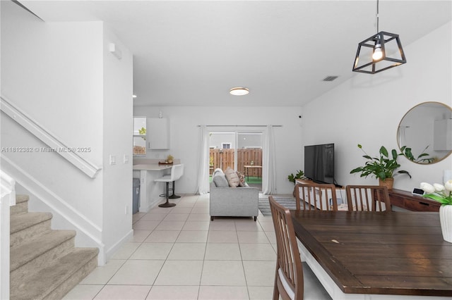 11835 NW 46th St, Coral Springs, FL 33076 - dining space with light tile patterned flooring and stairs