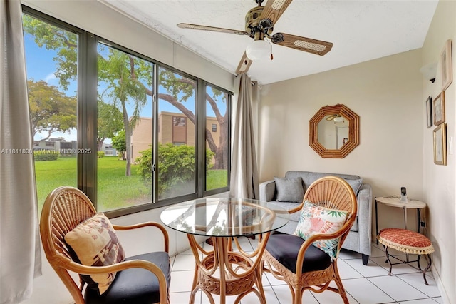 7355 NW 18th St Unit 106, Margate, FL 33063 - dining area featuring light tile patterned floors and ceiling fan