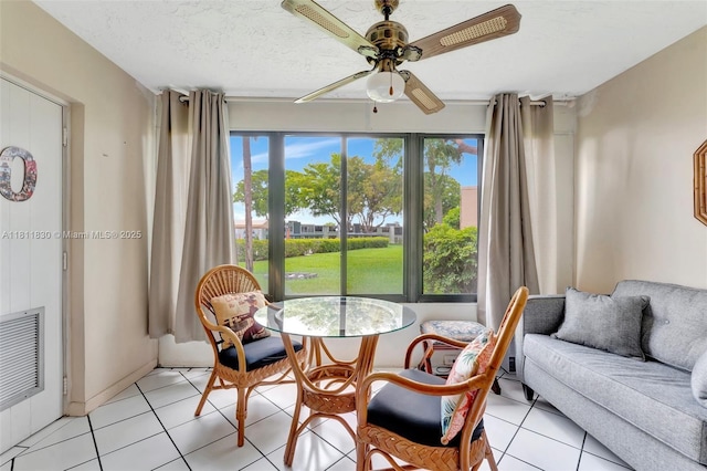 7355 NW 18th St Unit 106, Margate, FL 33063 - dining area featuring a ceiling fan and light tile patterned flooring