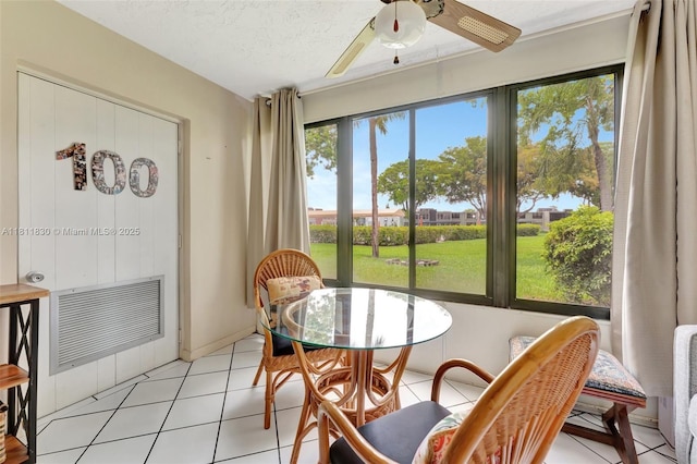 7355 NW 18th St Unit 106, Margate, FL 33063 - dining room with ceiling fan and light tile patterned flooring