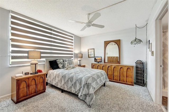 7355 NW 18th St Unit 106, Margate, FL 33063 - carpeted bedroom featuring a textured ceiling, a ceiling fan, and baseboards