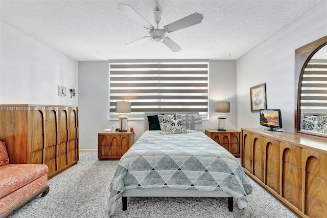 7355 NW 18th St Unit 106, Margate, FL 33063 - bedroom featuring carpet flooring, a textured ceiling, a ceiling fan, and baseboards
