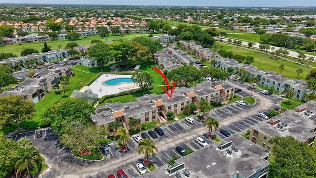 7355 NW 18th St Unit 106, Margate, FL 33063 - aerial view of property and surrounding area featuring a pool