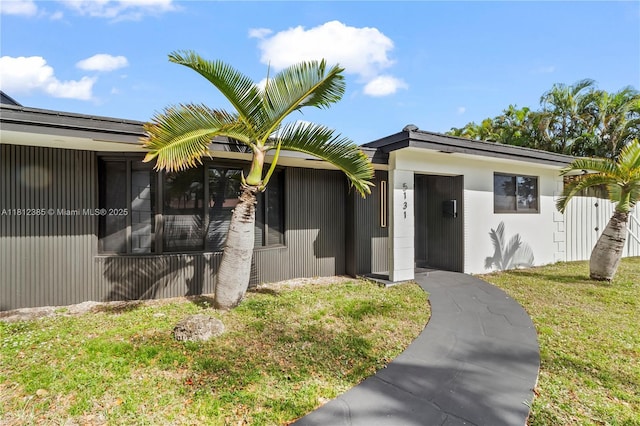 5131 Monroe St, Hollywood, FL 33021 - entrance to property featuring a yard
