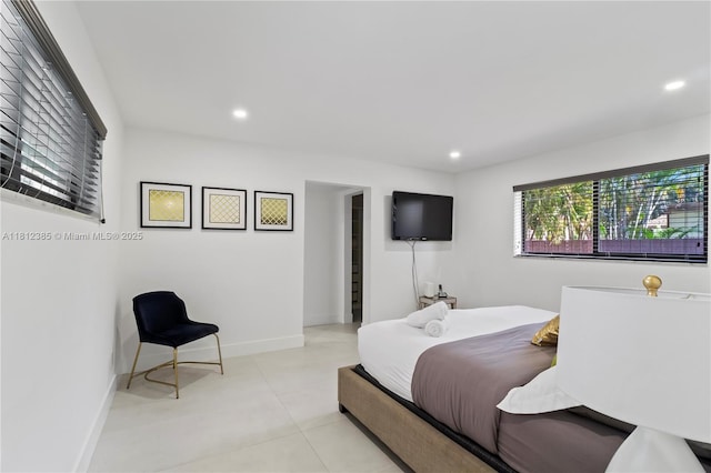 5131 Monroe St, Hollywood, FL 33021 - bedroom featuring recessed lighting, light tile patterned floors, and baseboards