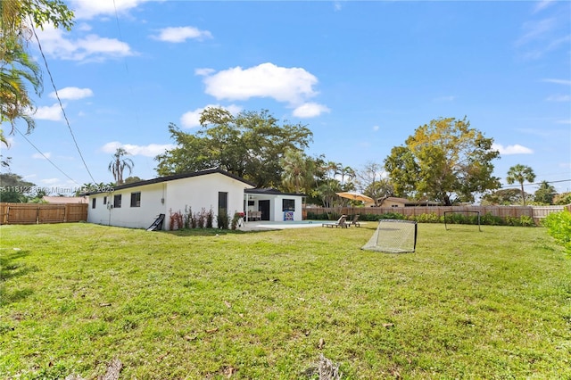 5131 Monroe St, Hollywood, FL 33021 - view of yard featuring a patio
