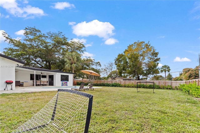 5131 Monroe St, Hollywood, FL 33021 - view of yard with ceiling fan and a patio