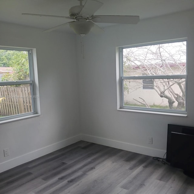 6421 Allen St, Hollywood, FL 33024 - unfurnished room featuring wood finished floors, ceiling fan, and baseboards