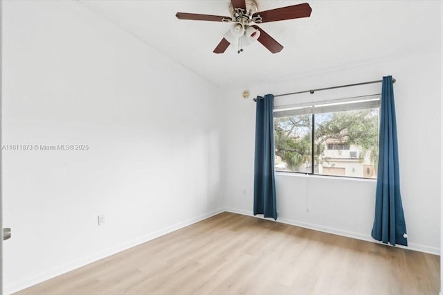 4225 N 76th Ave, Davie, FL 33024 - empty room featuring wood finished floors, a ceiling fan, and baseboards