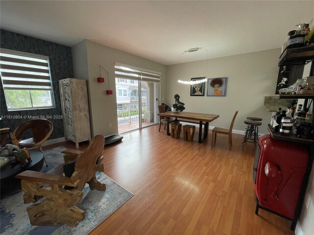 8980 W Flagler St Unit 202, Miami, FL 33174 - dining room featuring light wood finished floors and baseboards