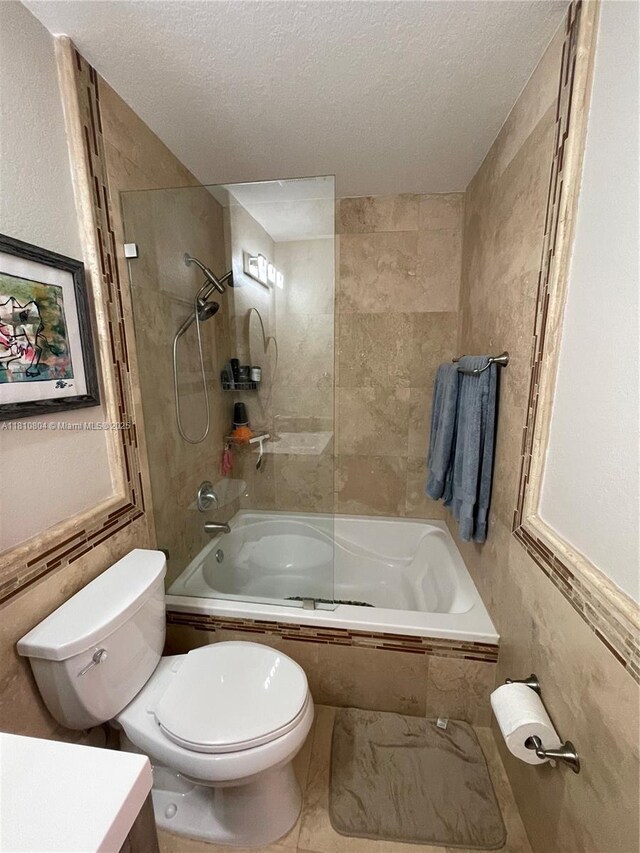 8980 W Flagler St Unit 202, Miami, FL 33174 - bathroom with toilet, a textured ceiling, tiled shower / bath combo, and vanity