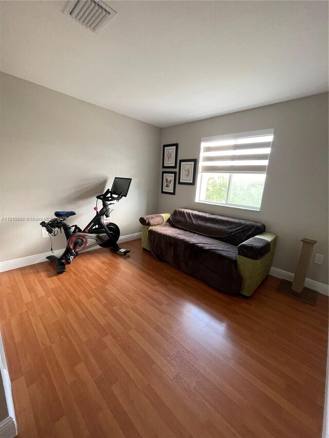 8980 W Flagler St Unit 202, Miami, FL 33174 - exercise room with wood finished floors and baseboards