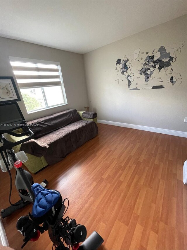 8980 W Flagler St Unit 202, Miami, FL 33174 - bedroom with wood finished floors and baseboards