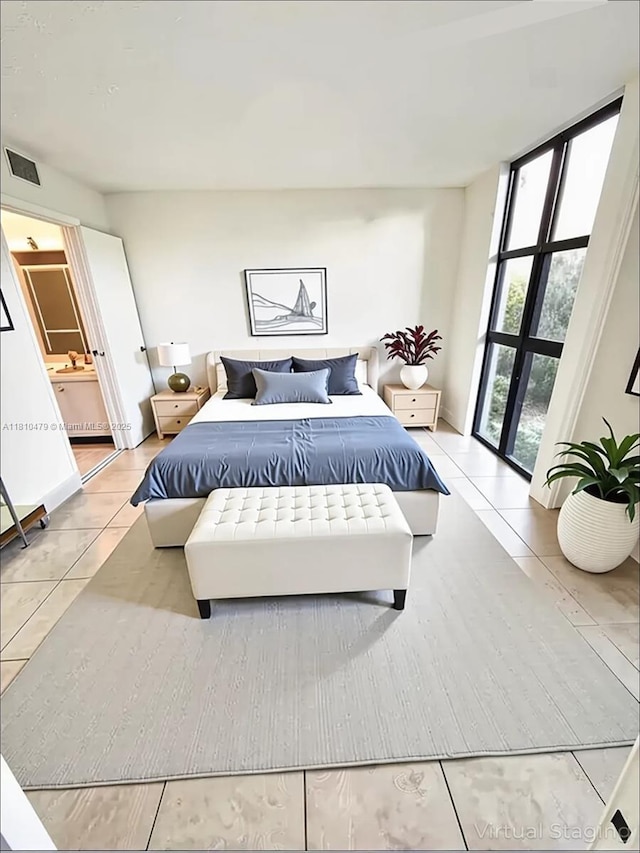 1000 Quayside Te Unit 509, Miami, FL 33138 - bedroom featuring light tile patterned floors