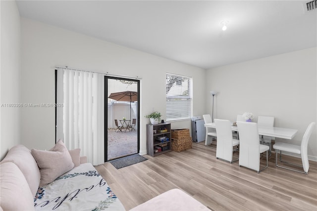 9214 W 33rd Ln, Hialeah, FL 33018 - living room featuring wood finished floors