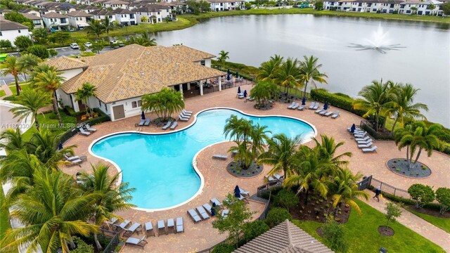 9214 W 33rd Ln, Hialeah, FL 33018 - community pool featuring a water view, a patio, and a residential view