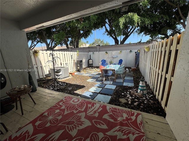 10428 NW 3rd St, Pembroke Pines, FL 33026 - fenced backyard featuring a patio area and outdoor dining area