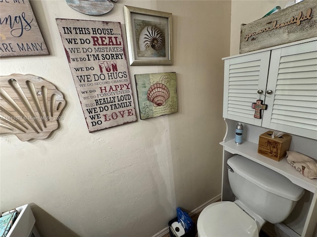 10428 NW 3rd St, Pembroke Pines, FL 33026 - bathroom with baseboards and toilet