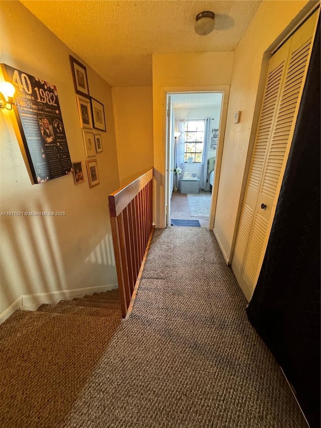 10428 NW 3rd St, Pembroke Pines, FL 33026 - hall featuring carpet floors, an upstairs landing, and a textured ceiling