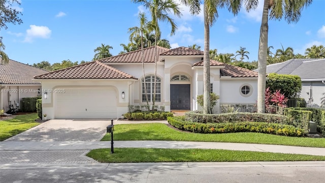 1220 Iris Ct, Weston, FL 33326 - mediterranean / spanish-style house featuring a tiled roof, stucco siding, an attached garage, and decorative driveway