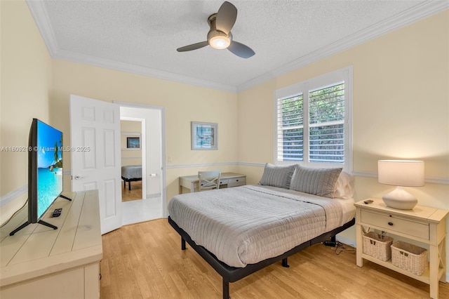 1220 Iris Ct, Weston, FL 33326 - bedroom featuring light wood-type flooring, a textured ceiling, ornamental molding, and ceiling fan