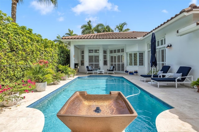 1220 Iris Ct, Weston, FL 33326 - swimming pool featuring a patio area
