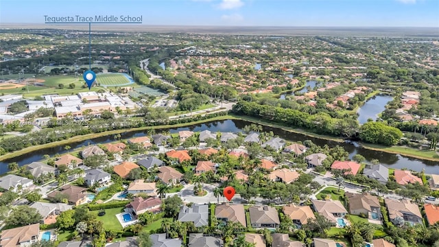 1220 Iris Ct, Weston, FL 33326 - aerial view of property and surrounding area with nearby suburban area and a nearby body of water
