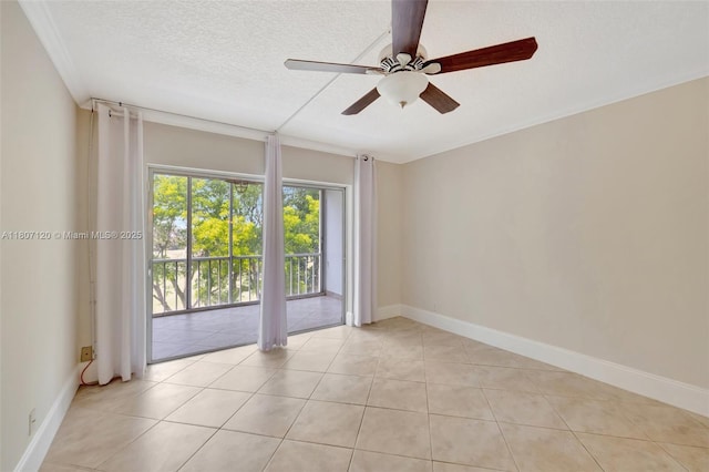 1055 Country Club Dr Unit 406, Margate, FL 33063 - spare room featuring ceiling fan, light tile patterned floors, baseboards, and a textured ceiling