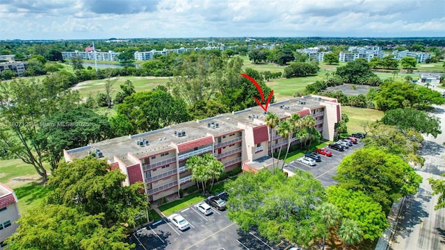 1055 Country Club Dr Unit 406, Margate, FL 33063 - aerial view of apartment complex / building, a golf course, and a tree filled landscape