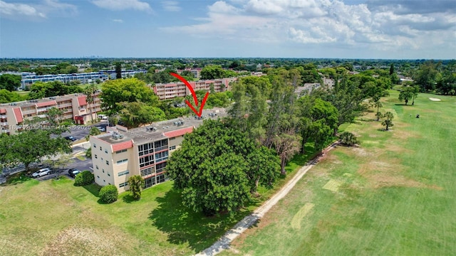 1055 Country Club Dr Unit 406, Margate, FL 33063 - drone / aerial view of a tree filled landscape and apartment complex