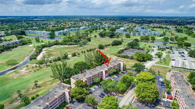 1055 Country Club Dr Unit 406, Margate, FL 33063 - bird's eye view of apartment complex / building and a nearby body of water
