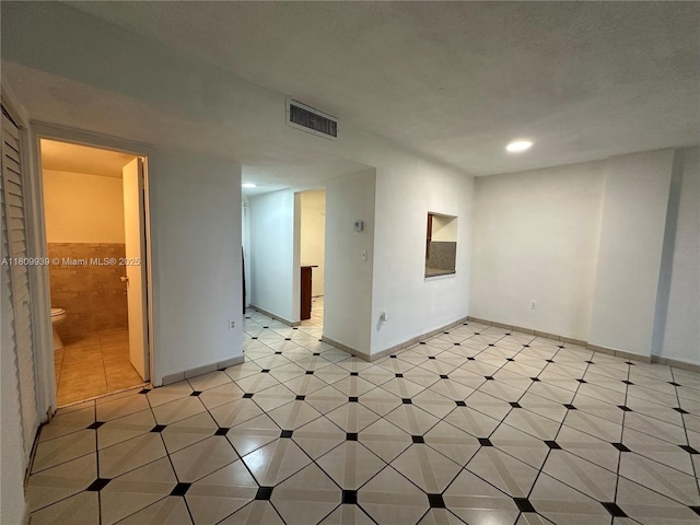 1130 11th St Unit 4J, Miami Beach, FL 33139 - empty room featuring baseboards and recessed lighting