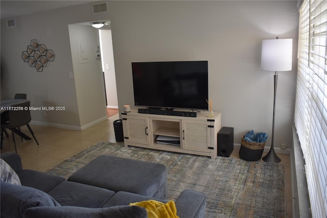 3586 N University Dr Unit U-6, Coral Springs, FL 33065 - living room featuring light tile patterned flooring and baseboards