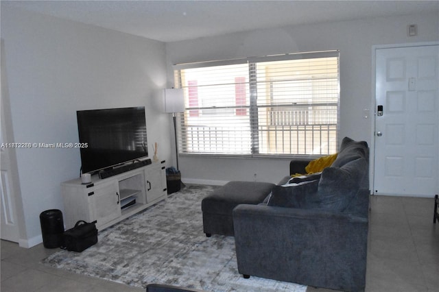 3586 N University Dr Unit U-6, Coral Springs, FL 33065 - living area featuring baseboards and tile patterned flooring