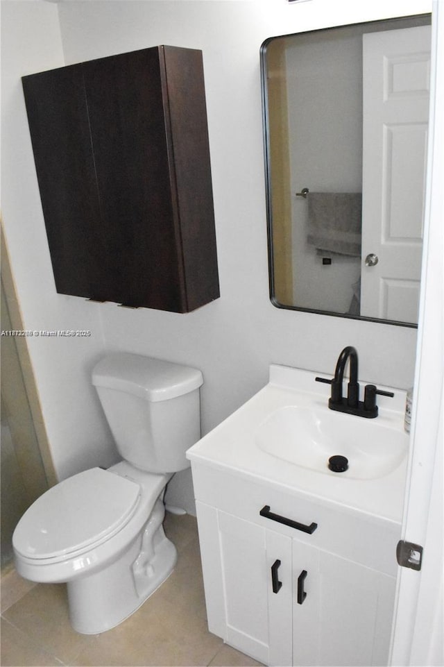 3586 N University Dr Unit U-6, Coral Springs, FL 33065 - bathroom featuring vanity, toilet, and tile patterned flooring