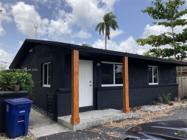 6132 SW 39th St, Miramar, FL 33023 - view of front of home with brick siding and stucco siding