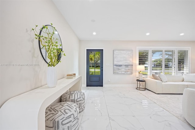 17243 SW 87th Ave, Palmetto Bay, FL 33157 - entryway with marble finish floors, plenty of natural light, recessed lighting, and baseboards