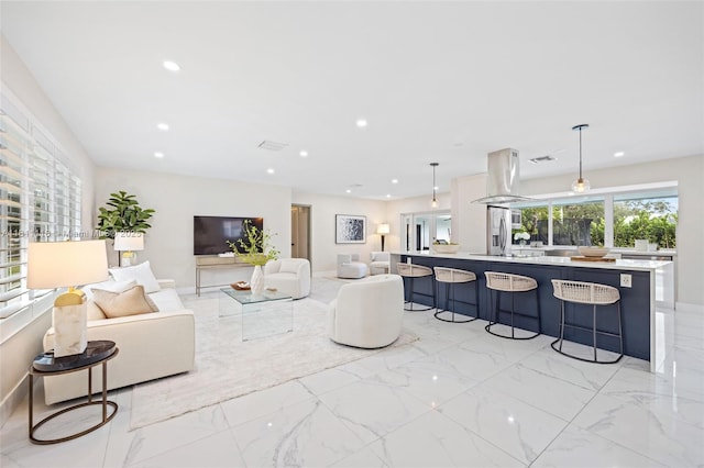 17243 SW 87th Ave, Palmetto Bay, FL 33157 - living area with light marble finish floors and recessed lighting